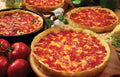 Four Deep Dish Pizzas Y952